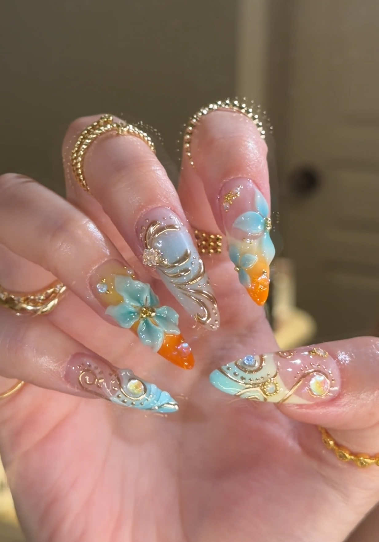 Nail reveallll 🩵🧡 #fyp #nailart #nailtransition #nailinspo #floralnails 