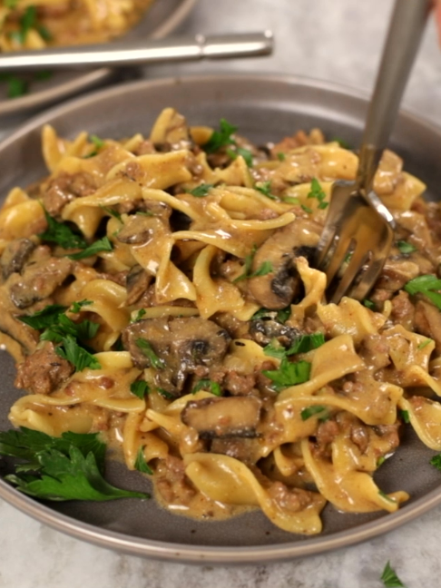 Need a quick dinner idea? This Ground Beef Stroganoff is creamy, comforting, and made in just one pot. No canned soup here! Super easy, budget-friendly, and ready fast. Your family will love it and you’ll want to make it on repeat! Find the full printable recipe at thefedupfoodie.com #groundbeef #familydinners #stroganoff #easyrecipe #easydinner #onepotmeals