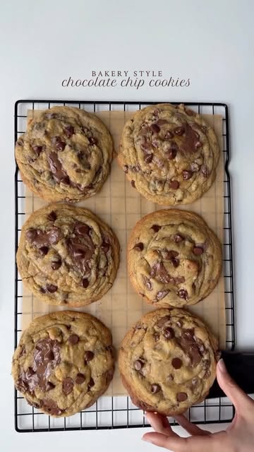 Bakery style chocolate chip cookies 🍪 

Ingredients 

3/4 cup (170g) unsalted butter, cold and cubed 
3/4 cup (150g) dark brown sugar
1/3 cup (65g) granulated sugar
1 large egg + 1 egg yolk, room temp
2 tsp vanilla bean paste
2 cups (240g) all-purpose flour
1 tsp cornstarch
1 tsp espresso powder
1/2 tsp baking soda
1 tbsp milk powder 
1/4 tsp baking powder
3/4 tsp salt
1 cup semi sweet chocolate chips
3/4 milk chocolate chips 
Flaky sea salt for topping

Method :

In a bowl add all purpose flour, baking soda, baking powder, milk powder, espresso powder , corn starch and salt. Mix well to combine.

In a stand mixer fitted with the paddle attachment, add the cold cubed butter, brown sugar, and granulated sugar.
Mix on medium speed for about 2–3 minutes, until the mixture looks creamy. 

Add the egg, egg yolk, and vanilla bean paste.
Mix until fully combined, scraping down the sides of the bowl as needed.

Gradually add the dry ingredients to the wet mixture.
Mix on low speed just until combined—do not overmix.

Stir in the semi-sweet and milk chocolate chips until evenly distributed.
�Cover and refrigerate the dough for at least 2 hours ( or up to 24 hours for deeper flavor and thicker cookies).

Preheat your oven to 350°F (175°C). Line a baking sheet with parchment paper.

Scoop large portions of dough (about ounce each) and roll loosely into balls.
For a bakery look, keep them tall rather than flattened.

Bake for 15-16 minutes, or until Edges are set and lightly golden. Centers are still soft and slightly underbaked. Sprinkle flaky sea salt on top immediately after baking.

Let cookies cool on the baking sheet for 5–10 minutes before transferring to a wire rack.

#cookies #thickcookies #recipe #baking